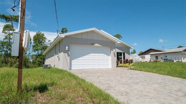 Building Photo - 6454 Freeport Dr