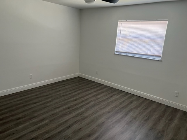 Bedroom with new ceiling fan - 4896 SE Horizon Ave