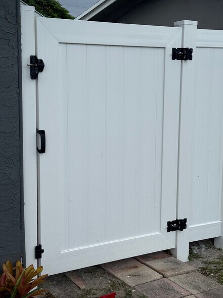 Keyed Access to Privacy Fencing - 128 NW 13th Avenue