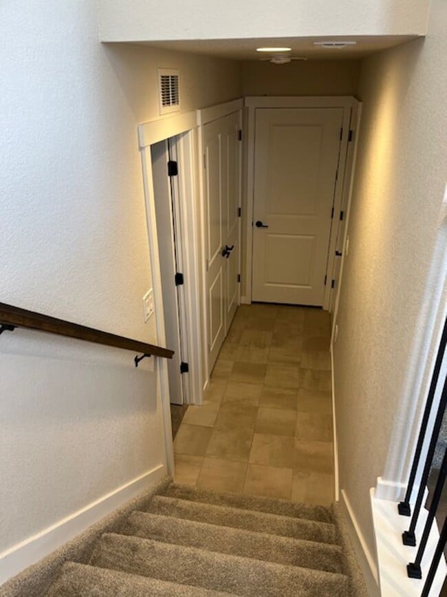 Building Photo - MODERN THREE STORY TOWNHOME WITH 2 CAR GAR...