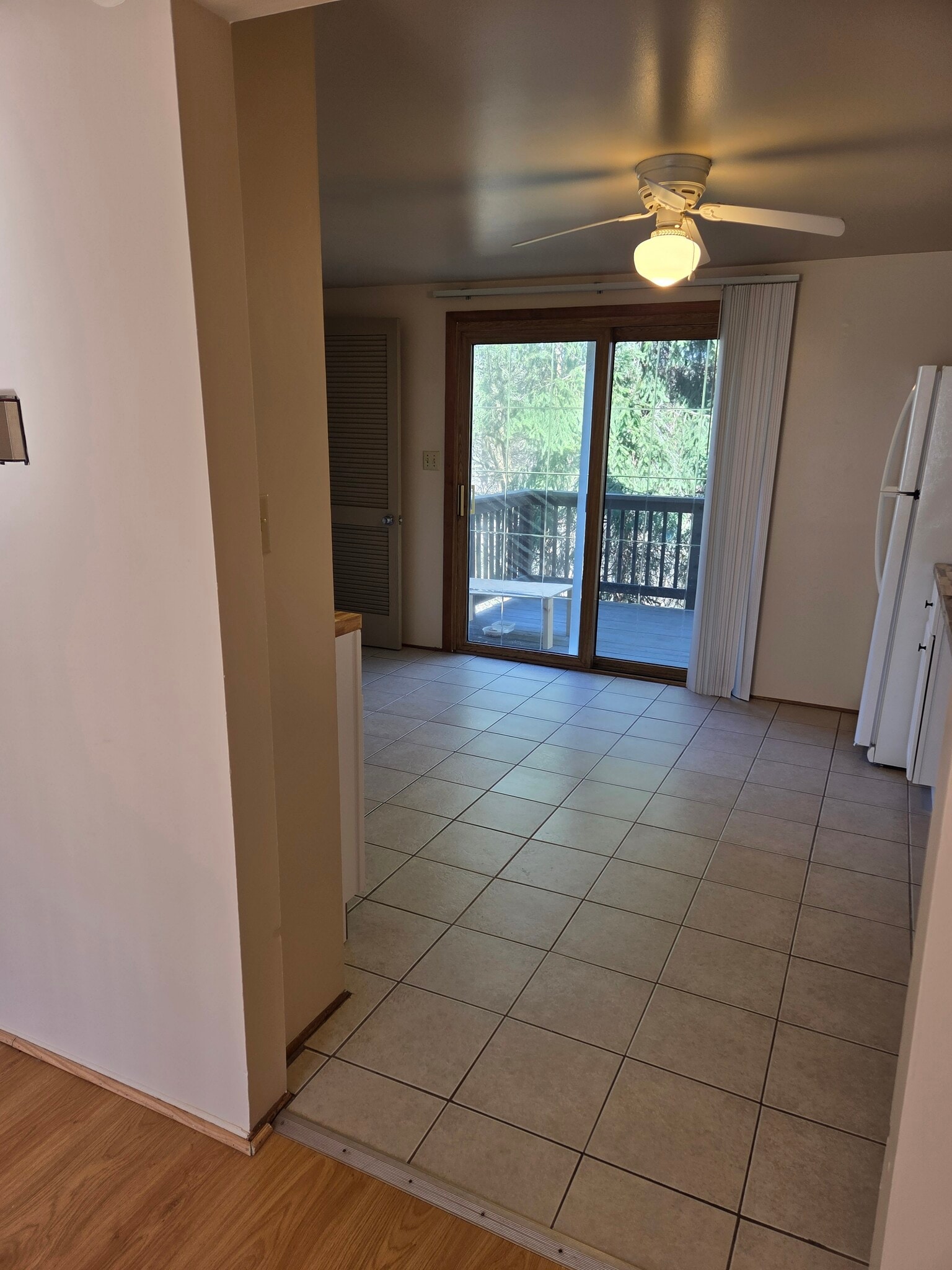 Sliding door in kitchen leads to back deck - 496 Mercer Rd