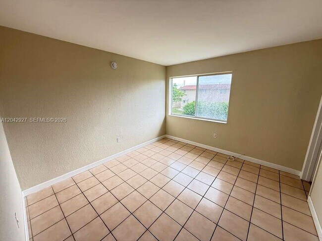 Building Photo - 1255 W 49th Pl