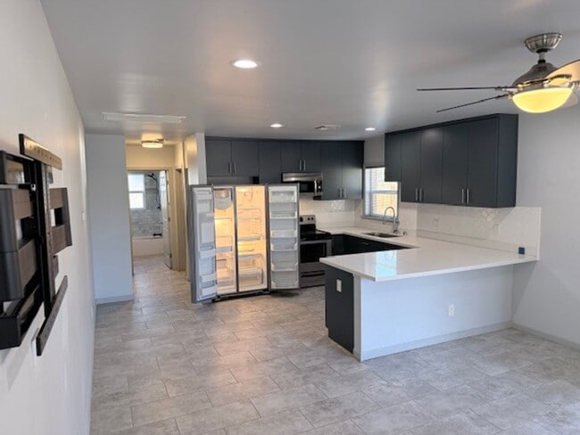 Building Photo - Utilities Included (a $200+ Savings) Charming Updated Duplex Home in Historic District!