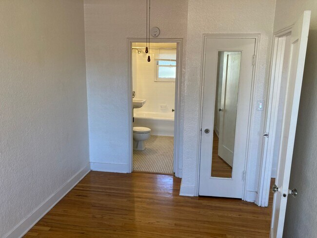 Building Photo - Spanish Garden Style Apartment Community