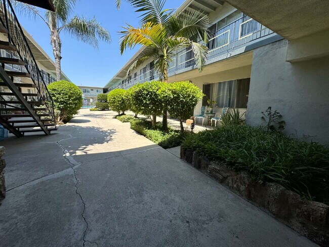 Building Photo - Newly remodeled studio in a gated building with pool and laundry room!