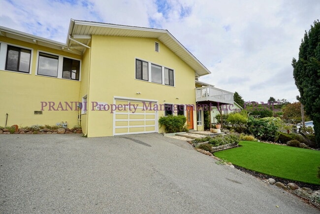 Building Photo - Bright and Inviting 4BR Home Minutes from ...