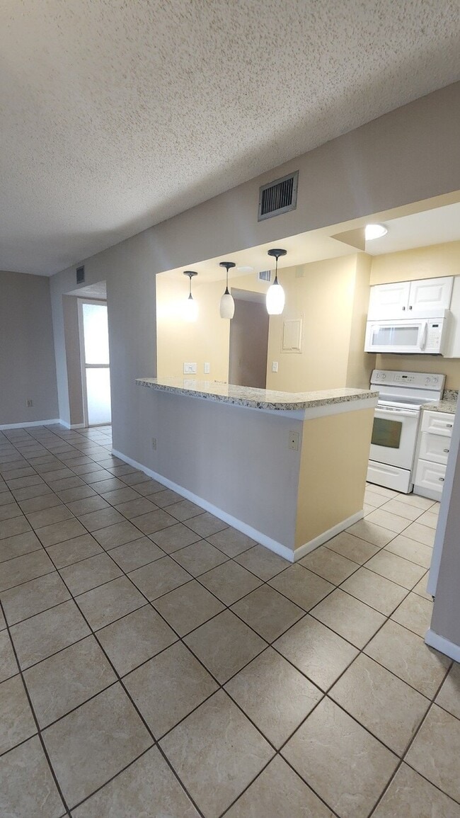 Building Photo - Conquistador 2 Bed 2 Bath - Just steps from the pool!