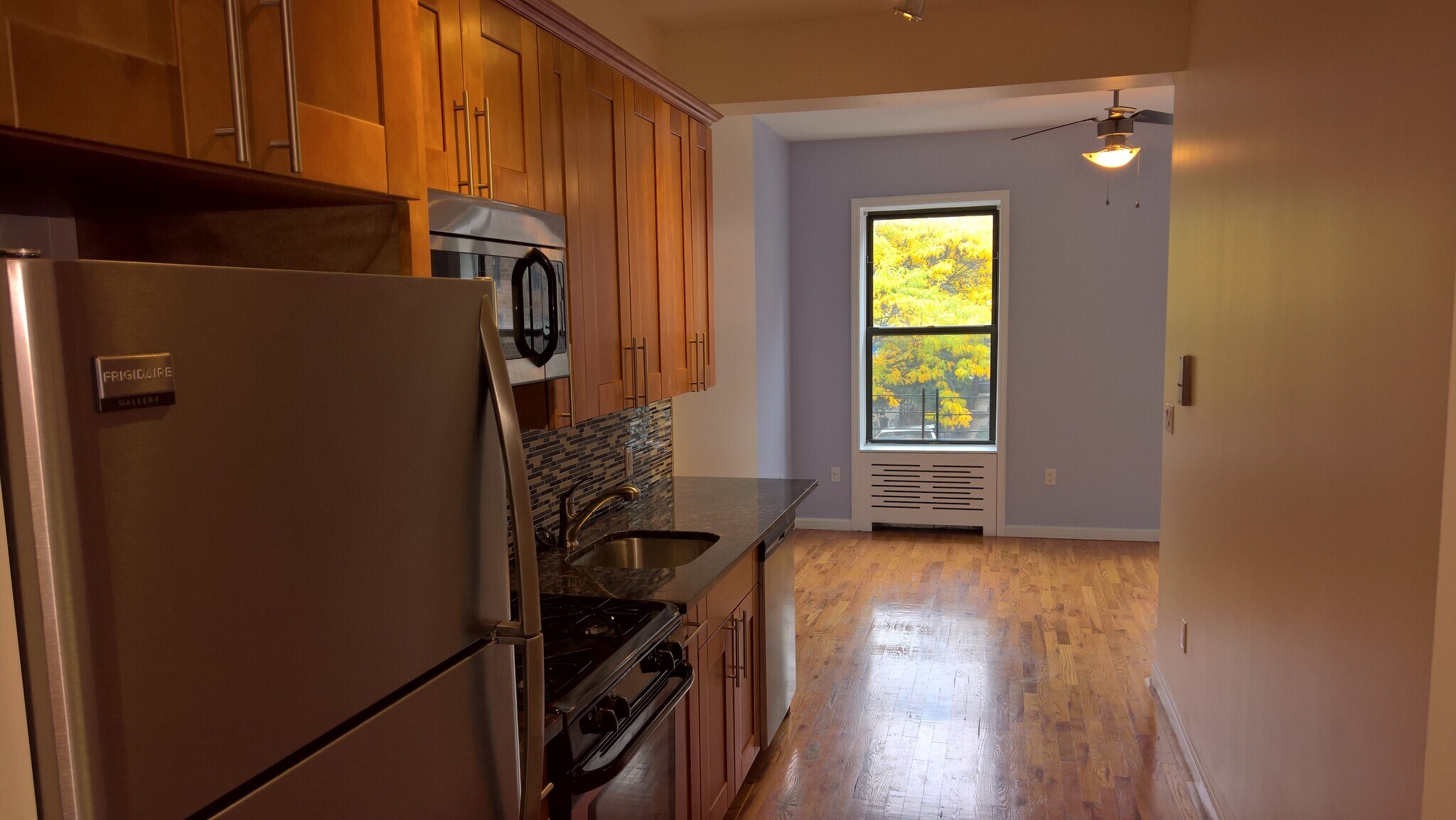 Kitchen to living room - 159 E 121st St