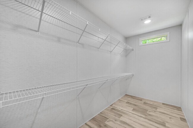 Building Photo - Experience exceptional living at its finest