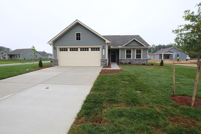 Building Photo - Maintenance Free Living in this Brand New ...