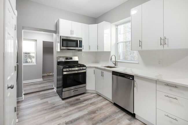 Building Photo - Renovated 4-Bedroom Home with Modern Finishes