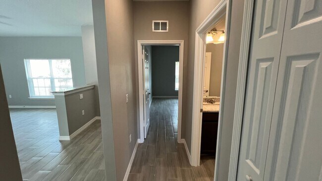 Building Photo - Smart & Stylish 3BD/2BA Palm Bay Home – Modern Upgrades, No Water Bills!