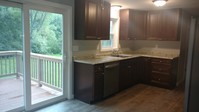 Kitchen with view of backyard and pond - 37 Porcupine Cir