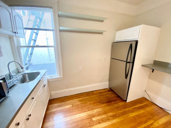 Building Photo - One Month Free!! Spacious Studio Offers Cl...