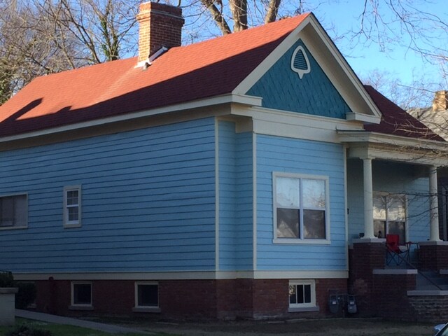 Exposes historic metal eaves - 1512 S Louisiana St