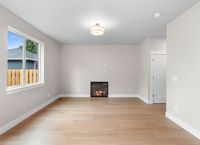 Building Photo - Beautiful New Construction 4-Bedroom Home with a Main-Level Bedroom, Designer Finishes, Attached ...