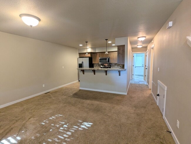 Building Photo - Gorgeous 3x2 townhouse, single-car garage, and two gas fireplaces