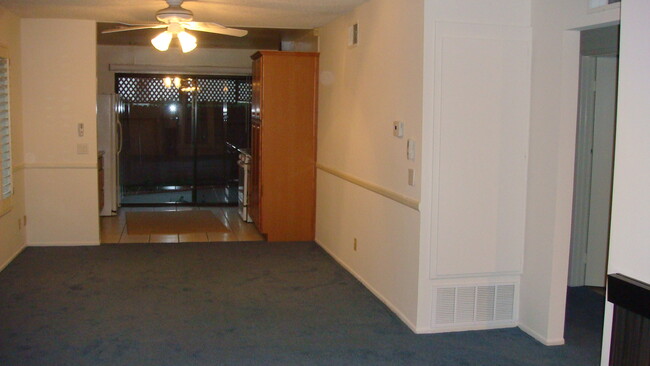 View from livingroom/dining into kitchen (now has hardwood laminate flooring) - 2870 N Cottonwood St