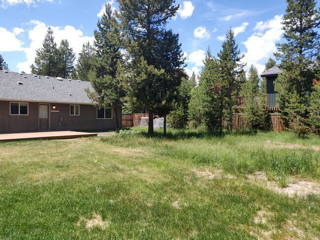Building Photo - Charming 4-Bedroom Home on 1/2 Acre with a Fenced Backyard, Fully Insulated Double-Car Garage, in...
