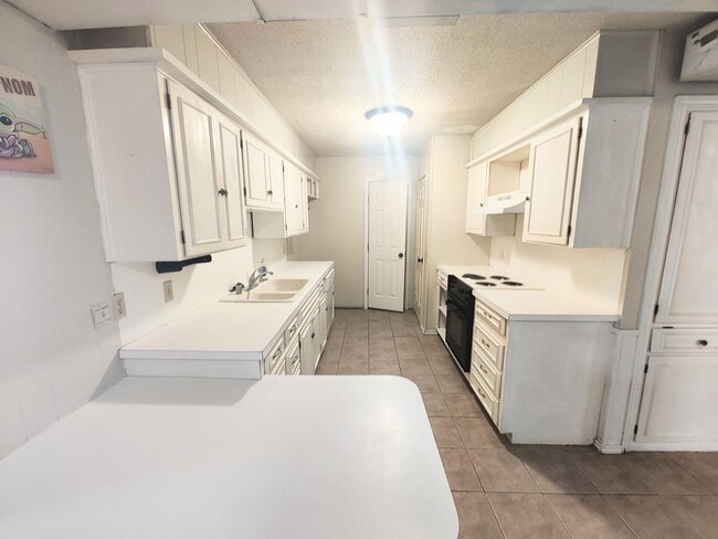 Building Photo - 1310 65th Dr