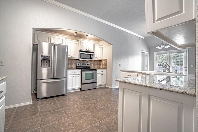 Building Photo - Spacious 4BR home in Bentonville with solar panels & Tesla EV charger!