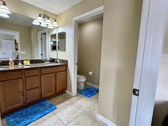 Building Photo - 8977 Coco Palm Rd