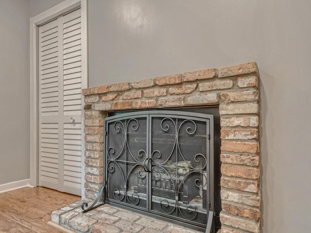 Electric fireplace in bedroom along with coat closet - 2100 Ridge Dr