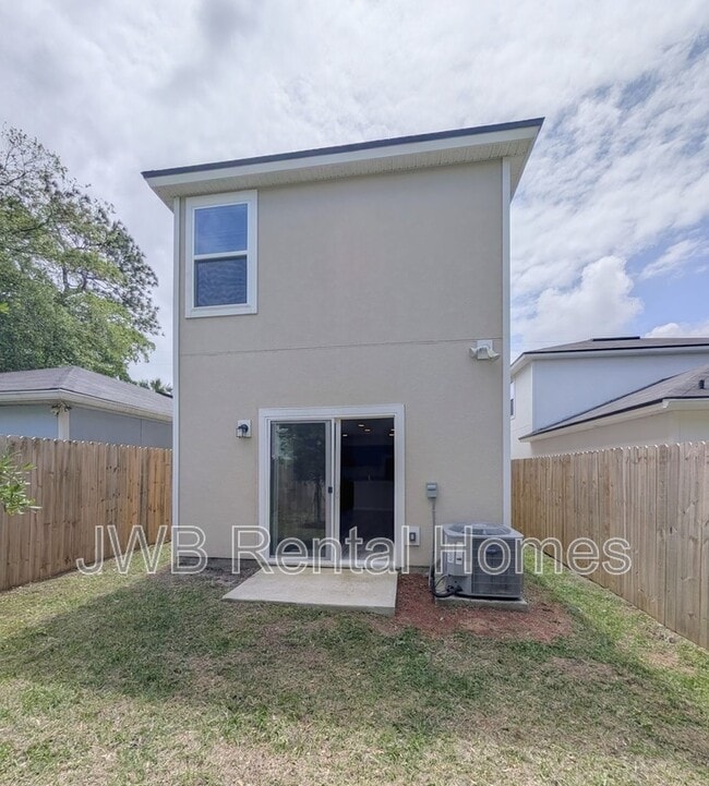 Building Photo - 9027 Cocoa Ave