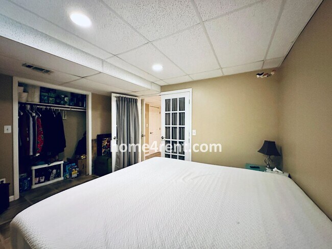Building Photo - A Lovely, Four Bedroom Lenexa Home w/ Wood...