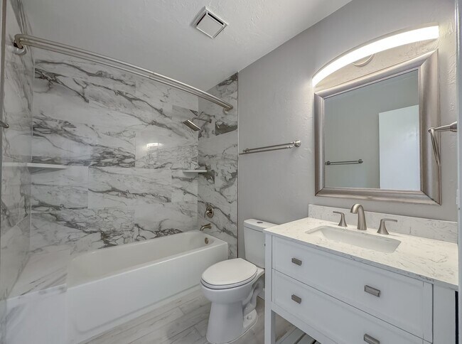 Building Photo - MODERN! Walk to FSU 2/2 w/ Marble Counters, Stainless Steel Appliances, & Privacy Fenced Yard! Av...