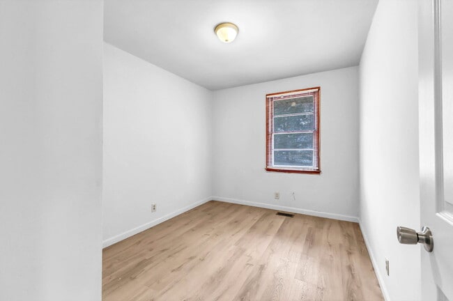 Building Photo - Cozy 3BR Home with Spacious Yard & XL Carport!