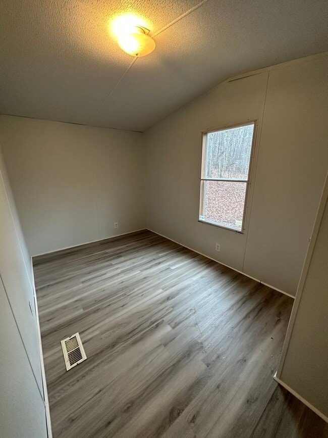 Building Photo - Two bedroom single wide on private lot off...