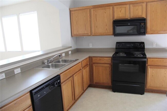 Building Photo - 9306 Magna Carta Loop