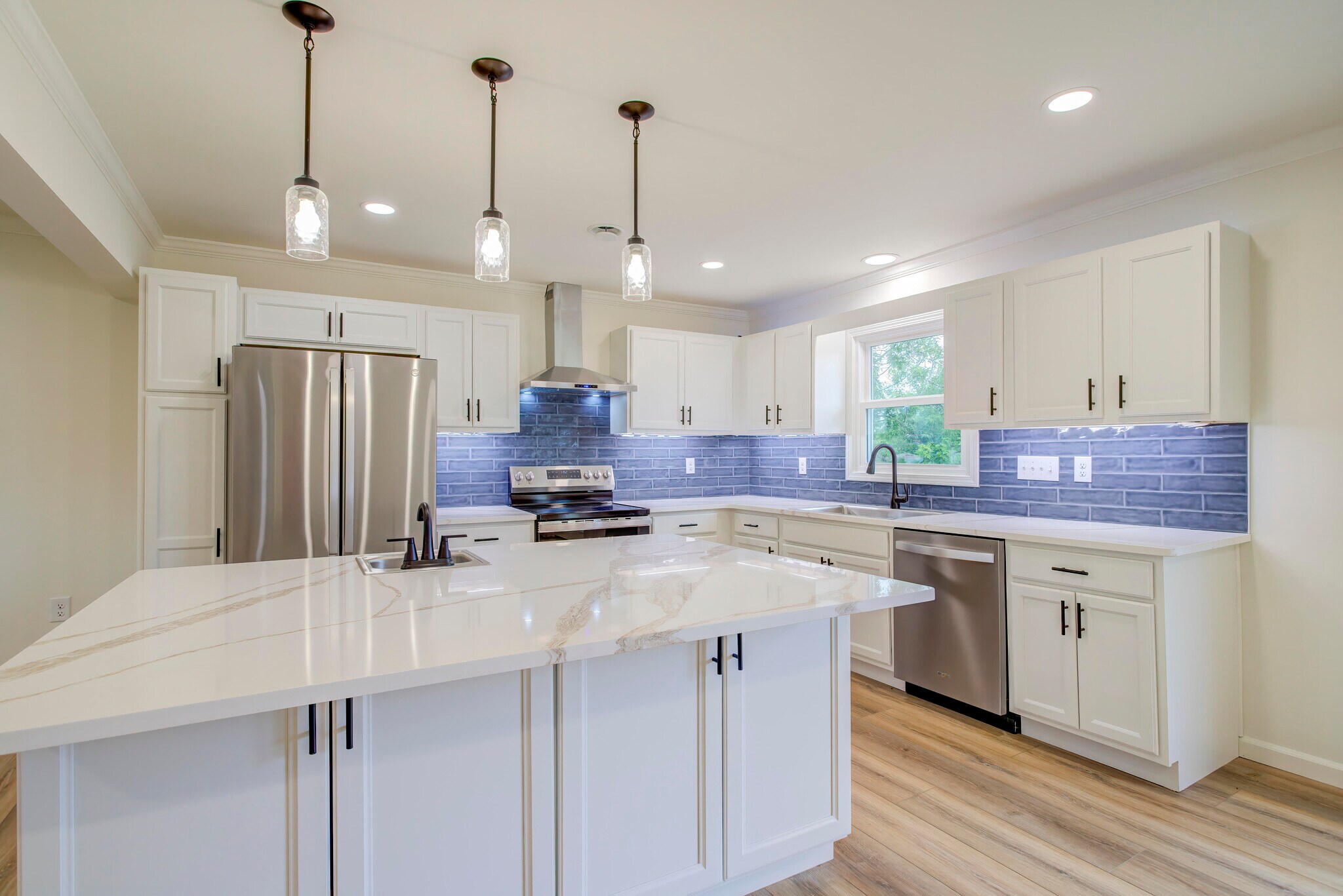 New quartz countertops, modern tile backsplash, pendant lighting, new cabinets - 288 Beaver Rd
