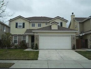 Building Photo - Freshly Painted 4-Bedroom Home