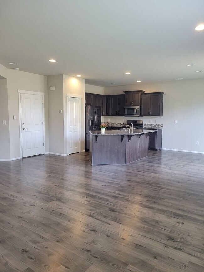 Building Photo - 3 bedroom home with 3 car garage on corner...