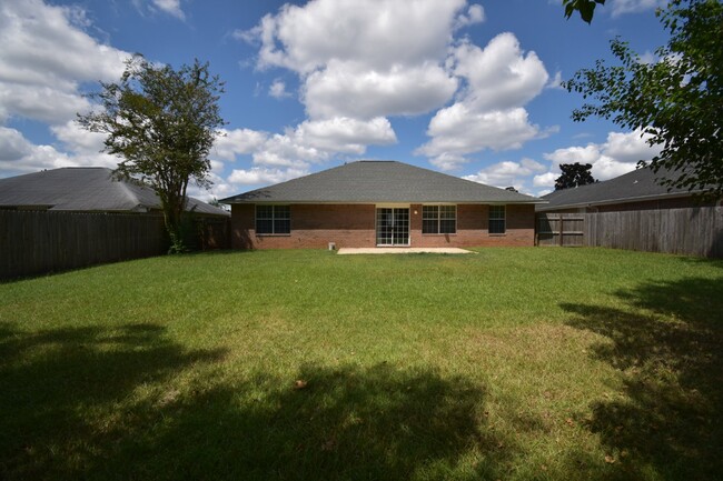 Building Photo - Clean & spacious 3/2 Brick home Near NAS P...