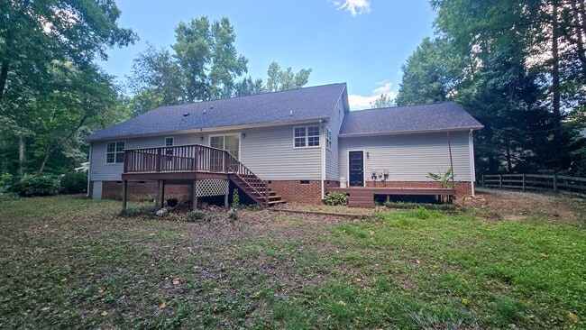 Building Photo - 5607 Whispering Pines Dr