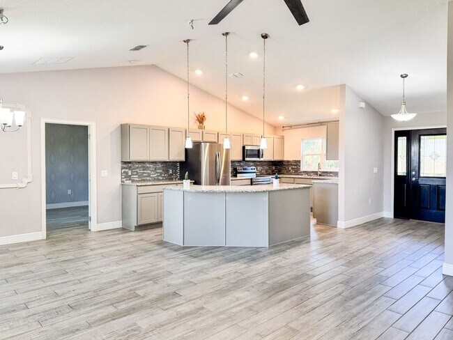 Building Photo - LAKE FRONT BRAND NEW Beautiful 3 bedroom on Lake Toho!