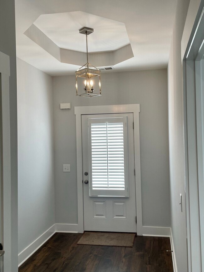Front Door with Plantation Shutters - 5100 Gracious Drive