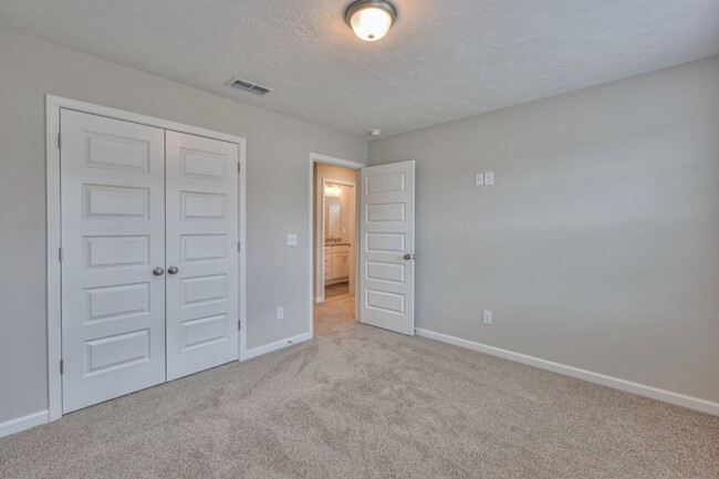 Building Photo - Brand New Luxury Townhome! 3 BR, 2.5 BA, 2 Car Garage, Pool, Dog Park, and More!