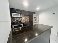 Building Photo - 4301 NW S Tamiami Canal Dr