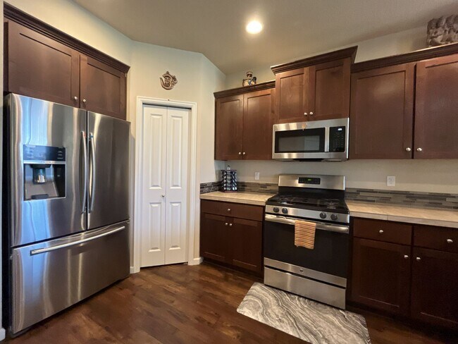 Building Photo - Stunning 4 Bedroom + Loft Bethany Home with Open Layout, Stainless Steel Kitchen, Two Car Garage ...