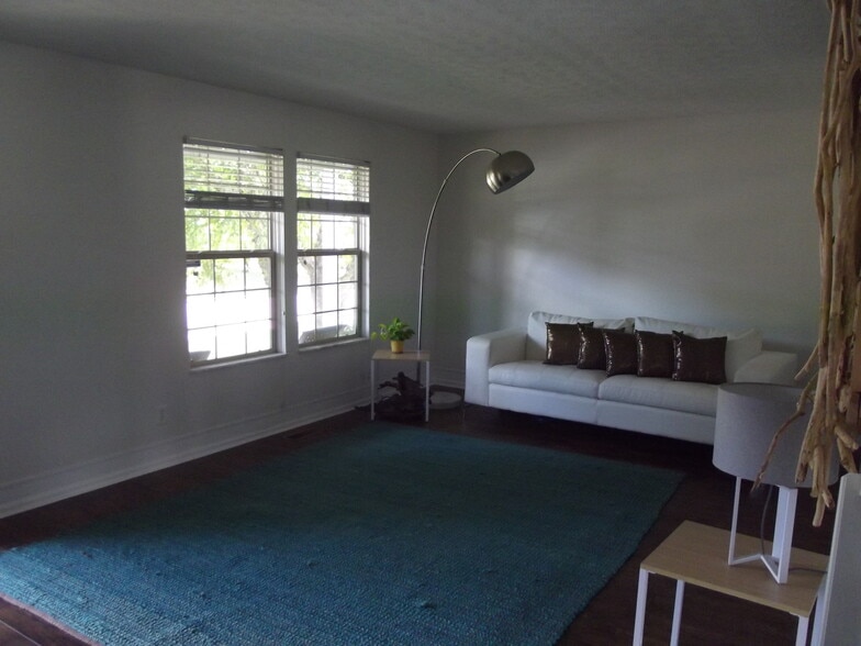 Front room can be used for dining room or additional living room. - 1074 Lakegrove Court