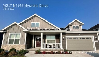 Building Photo - W217 N6192 Masters Drive-