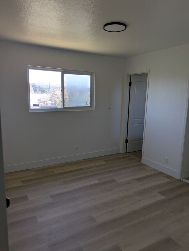 Building Photo - **Spacious 4-Bedroom, 2-Bath Residence with Waterfront & Hillside Views – Vallejo**