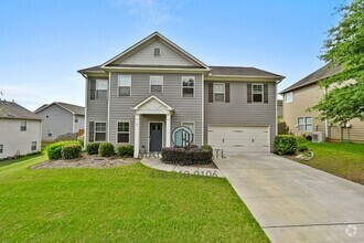 Building Photo - Spacious 4BR/2.5BA Home in Desirable Liber...