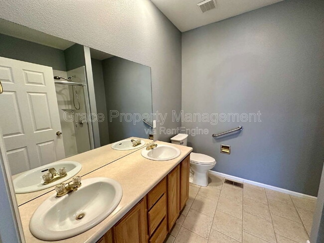 Building Photo - 9064 W Phillips Dr