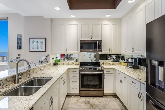 Building Photo - Stunning High-Rise Condo with Gulf Views –...