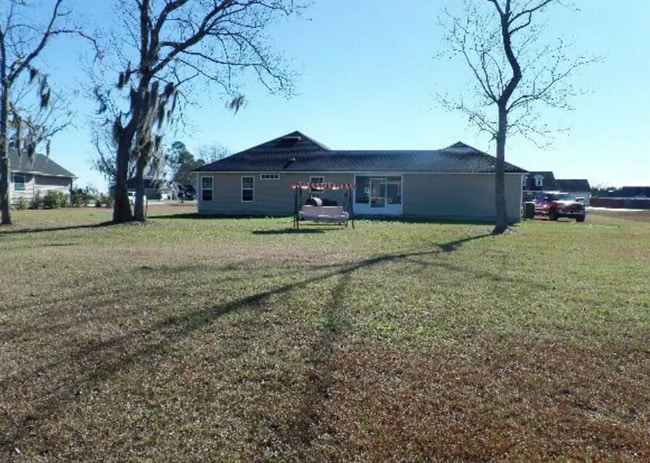 Building Photo - Charming 3BR Home with Open Floor Plan, Screened Porch & Covered Front Porch in Lakeland